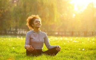 bigstock-Happy-Young-Woman-Sitting-In-Y-92821181 (1)